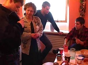 Horny granny gets fucked by multiple guys at the same time
